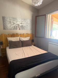 Giường trong phòng chung tại gite le repos des chênes option spa extérieur Evasion nature et confort ! +19 ảnh