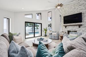 a living room with a couch and a fireplace at Sea La Vi in Navarre