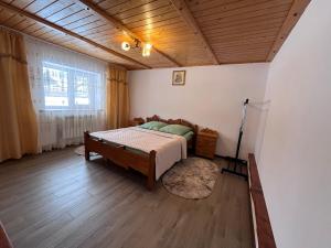 En eller flere senge i et værelse på Vodograi