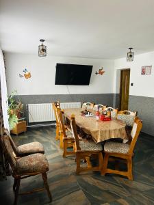 Et tv og/eller underholdning på Casa Rarăului