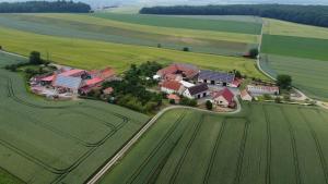 an aerial view of a house in the middle of a field at Zwischen Wald und Wiese in Lilach