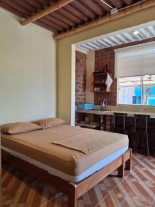 Giường trong phòng chung tại Bungalows de Chotos