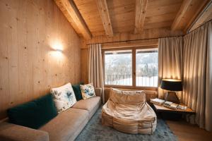 Et opholdsområde på SportLodge MOUNTAIN SUITE - AlpenLuxus Collection