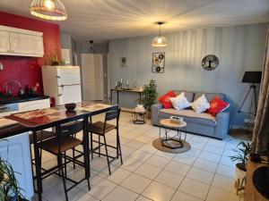 Køkken eller tekøkken på Maison chaleureuse au calme