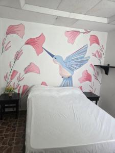 Giường trong phòng chung tại Casa de descanso Cartagena-Turbaco