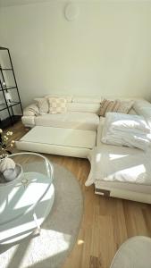 אזור ישיבה ב-Modern Nyborg Suites