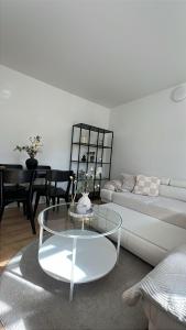 אזור ישיבה ב-Modern Nyborg Suites