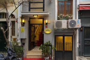 a building with a door and a sign on it at BeyPort Hotel Istanbul in Istanbul