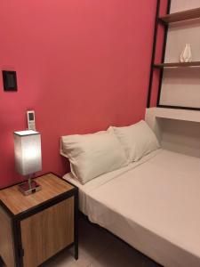 En eller flere senge i et værelse på Adhoc Fundidora