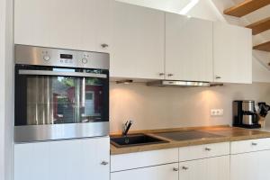 Kuchyň nebo kuchyňský kout v ubytování Reetzeit 2