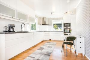 Køkken eller tekøkken på Fantastisk opplevelse i sør! Nydelig & avslappende