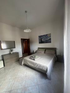 En eller flere senge i et værelse på Casa di Isma