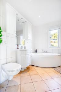 Et badeværelse på Fantastisk opplevelse i sør! Nydelig & avslappende