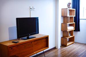 Et tv og/eller underholdning på Hospede-se em Tiradentes - apartamento e suite