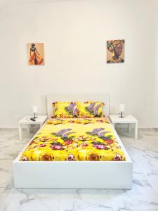 En eller flere senge i et værelse på Hamjago