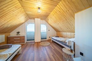 Postel nebo postele na pokoji v ubytování Osada Golców