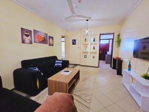 Et tv og/eller underholdning på Two bedroom apartment, Mombasa CBD