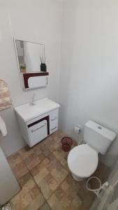 Et badeværelse på Casa de Praia em Maceió - Camocim - CE