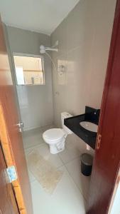 Et badeværelse på Flat em Carapibus + 1 billede