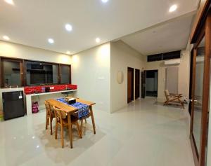 Kuchyň nebo kuchyňský kout v ubytování Omi Homestay + 7 fotografií