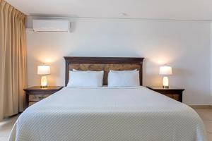 En eller flere senge i et værelse på Maho Beach 1BR Getaway with Beach Access + 12 billeder