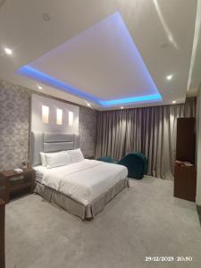 Giường trong phòng chung tại لؤلؤة راحتي للشقق الفندقية