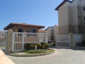 een wit hek voor een huis bij Ilhéus in Ilhéus