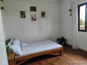 a room with a bench in a room at Magayon viewpoint in Damasanan +9 photos
