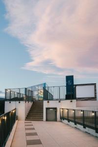a set of stairs on top of a building at Hotel Parangvue in Goseong