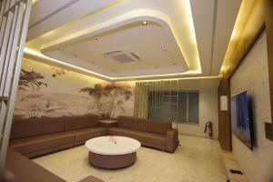 Et opholdsområde på Hotel The Crown Inn Jhunjhunu