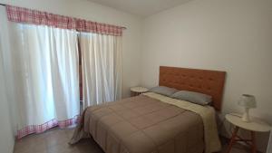 Katil atau katil-katil dalam bilik di Camila