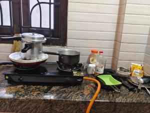 a mixer sitting on top of a counter at JM Niwas in Guwahati