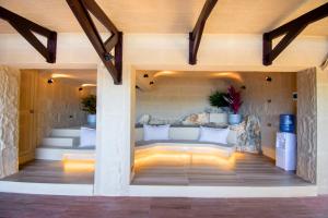 a room with a bed with lights on the floor at Encantada Residences in Boracay