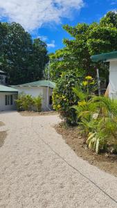 a house with a driveway in front of it at KAIA VILLAGE, Santa Teresa, Costa Rica in Santa Teresa Beach