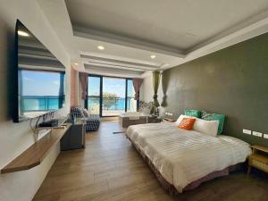 En eller flere senge i et værelse på Rockhand Homestay