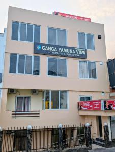 a building with a sign that reads cancer vienna view at Ganga Yamuna View in Prayagraj