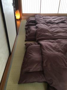 Posezení v ubytování Nara Guesthouse Kamunabi