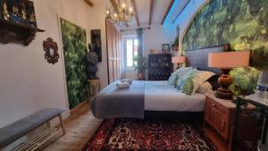 En eller flere senge i et værelse på Clos Germanois