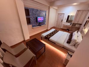 Et tv og/eller underholdning på Hotel Alka Residency