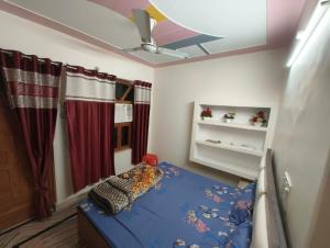 Giường trong phòng chung tại Vb Hotel