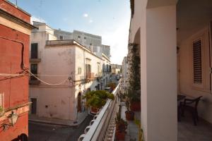 a view of a city street from an apartment balcony at Ciao Bello B&B in Martina Franca