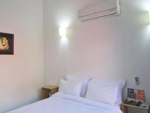 Postel nebo postele na pokoji v ubytování Zana Hotel Boutique