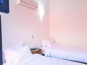 Postel nebo postele na pokoji v ubytování Zana Hotel Boutique