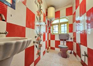 a bathroom with a sink and a toilet at Kashmir naaz in Srinagar +48 photos