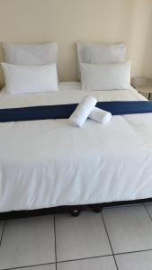 Giường trong phòng chung tại Shelly Beach Guest House