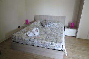 Postel nebo postele na pokoji v ubytování Cristallo Camere