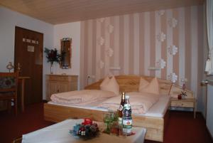 Postel nebo postele na pokoji v ubytování Alpenchalet Bianca