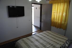 Postel nebo postele na pokoji v ubytování Holiday Home Mađerka
