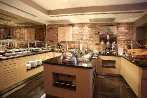 a kitchen with a counter with a pot on it at Berjer Boutique Hotel & Spa in Istanbul