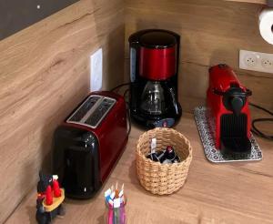 a counter top with a coffee maker and a toaster at T3 Gîte le Canigou in Trévillach +10 photos